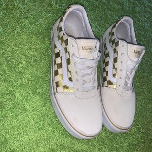 Gold and white Vans!